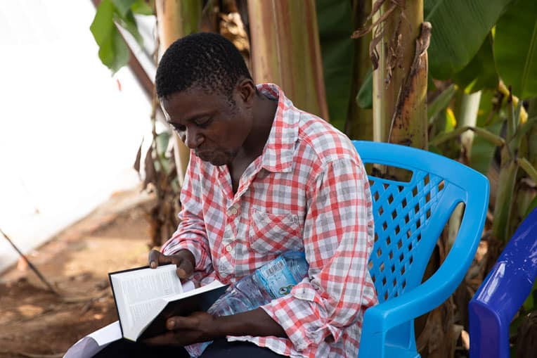 We gave Kavoro, a new Christian, a Bible in Swahili before he left the treatment center.