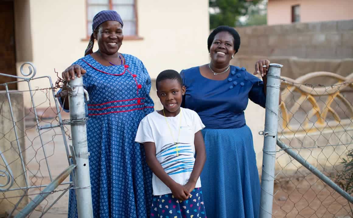 Queen’s Sunday School teacher, (right), and her mother are excited to see Queen growing in her relationship with the Lord.