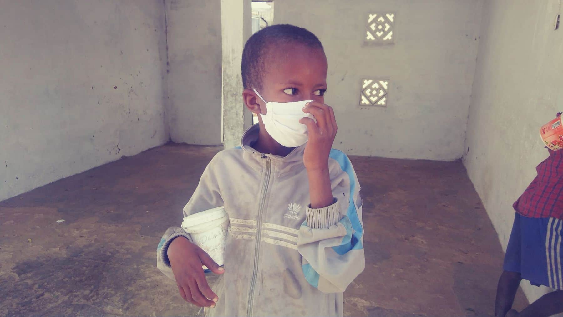 Our partners also keep the children safe with by providing them with masks.