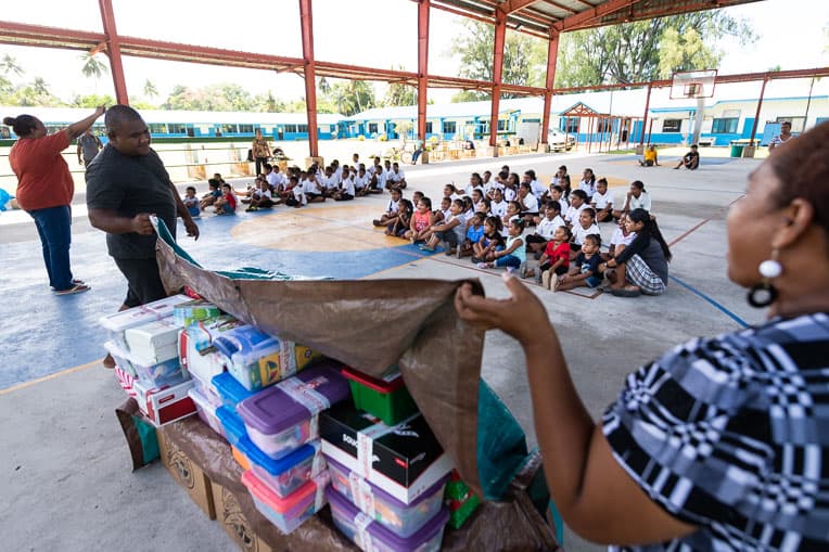 After sharing the Gospel message, ministry partners in Palau unveil shoebox gifts to the children at Peleliu Elementary School.