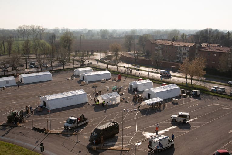 We are setting up our mobile medical facility in the Cremona Hospital parking lot.