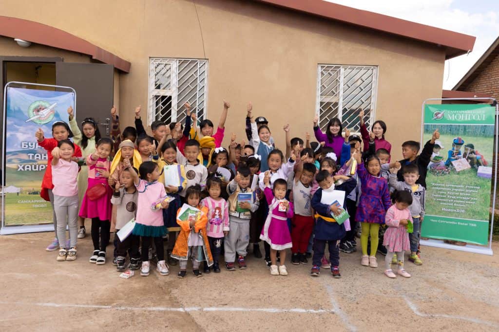 Children celebrate after their graduation from The Greatest Journey at Living Stone Church.