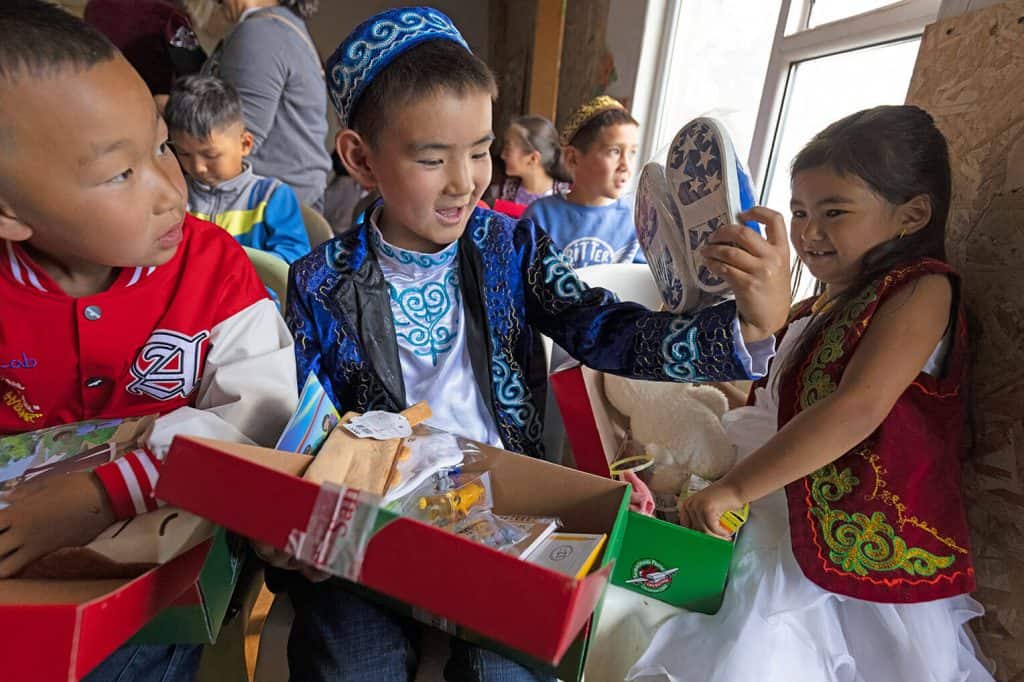 Batima was surprised to get a pair of shoes in his Operation Christmas Child gift.