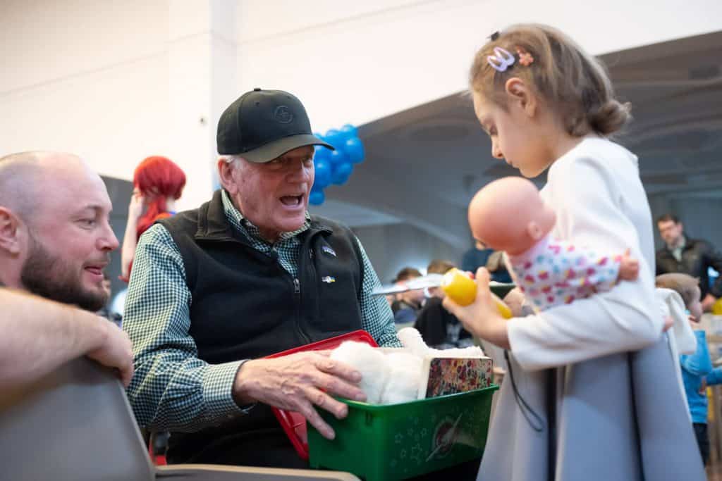 Samaritan's Purse President Franklin Graham celebrates 200 millionth shoebox gift with 4-year-old Natalya.