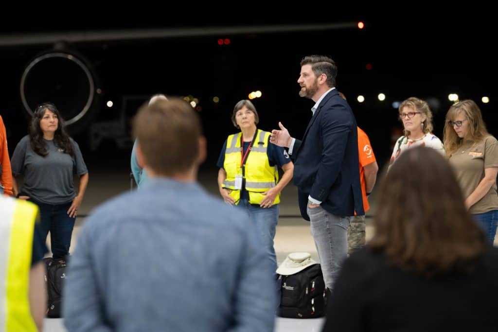 Edward Graham, who was aboard the airlift, encouraged the team before take off.