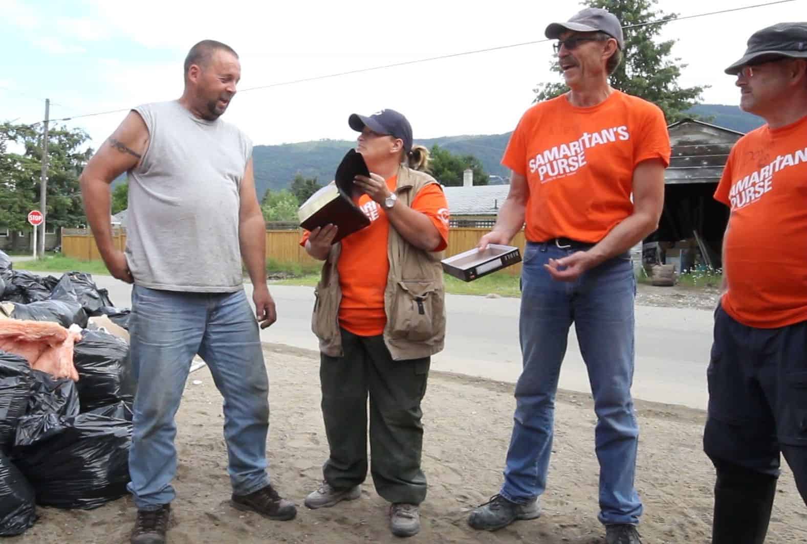 Our work includes spraying an anti-mold solution on the lower part of the walls, and presenting each homeowner—if he or she is willing to receive it—with a Bible signed by the clean-up volunteers.