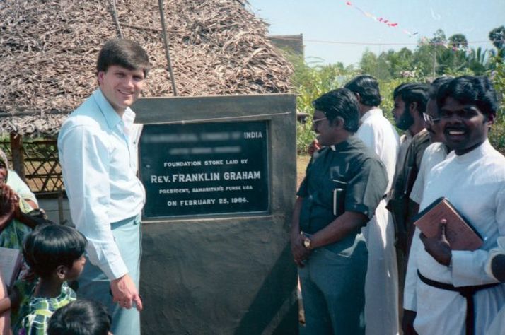 Franklin Graham lays the foundation stone for a church in India in 1984. (Name and location blurred for security.)