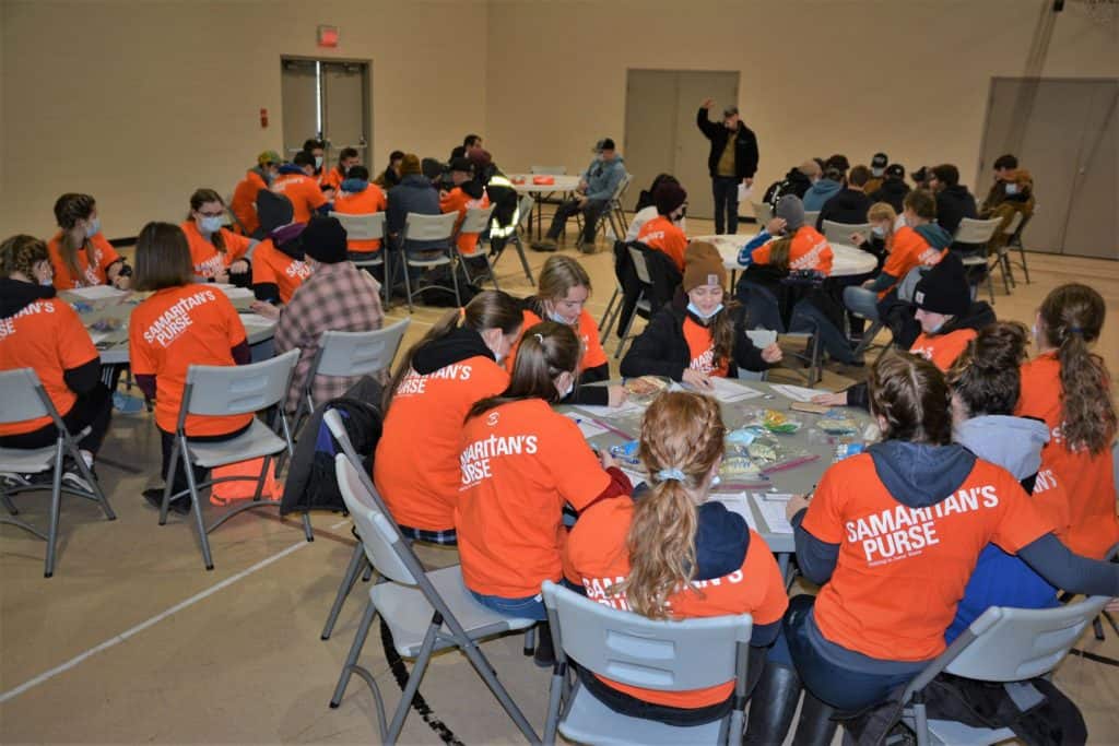 Before heading out to do their volunteer flood clean-up work, Timothy Christian School students received basic safety training from a Samaritan's Purse staff member.