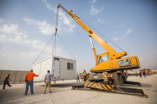Module being moved by machinery