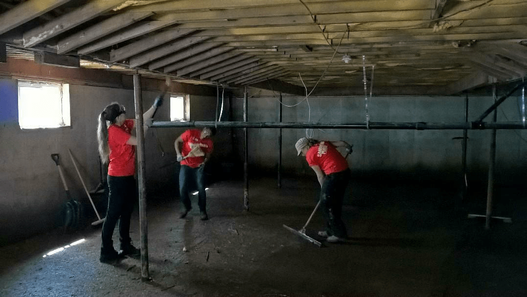 Samaritan's Purse volunteers clean out flooded basements in New Brunswick.