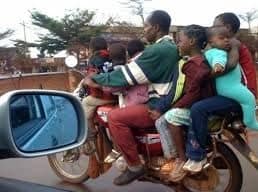 Seven people on a motorcycle