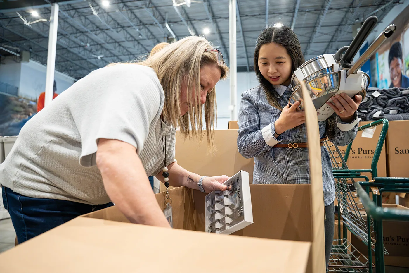 Volunteers prepare disaster relief supplies at the Samaritan’s Purse Calgary warehouse
