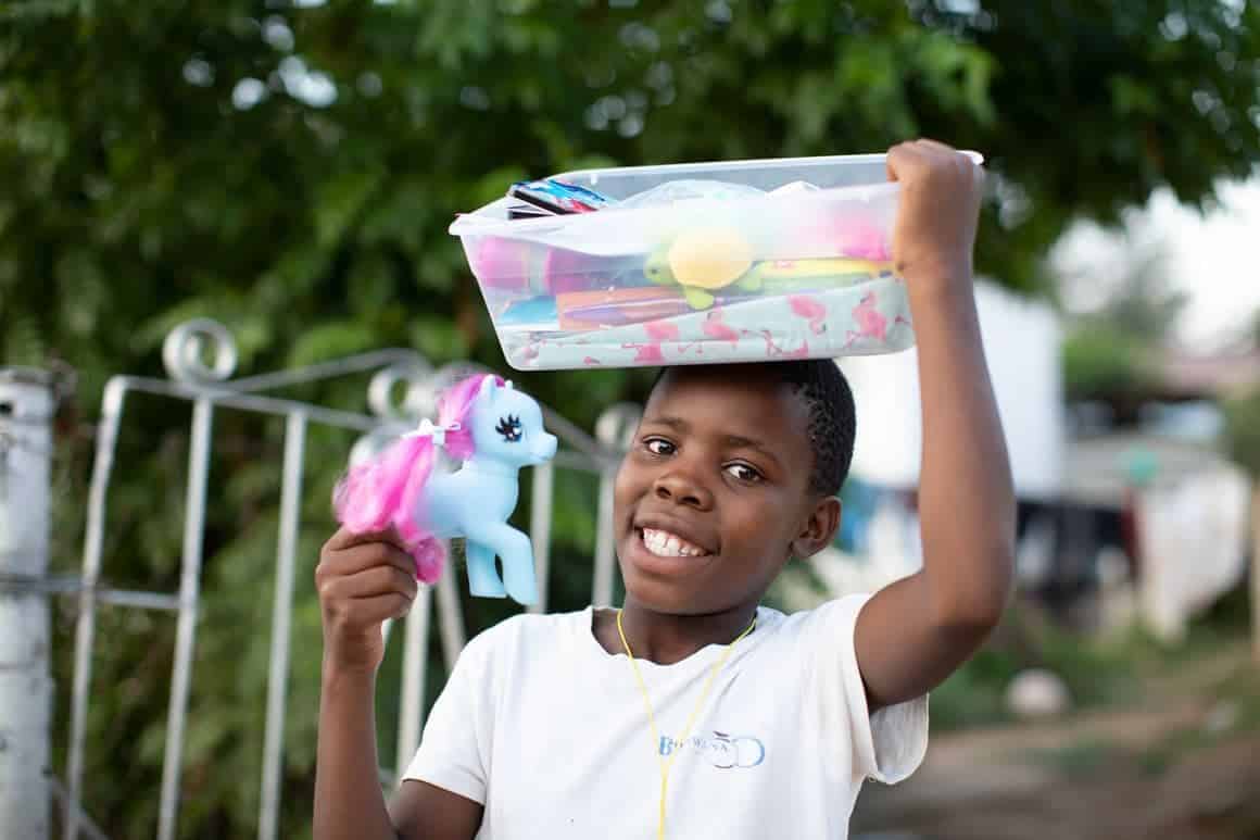 Queen was delighted to find wonderful gifts in her shoebox that helped open her heart to God's love.